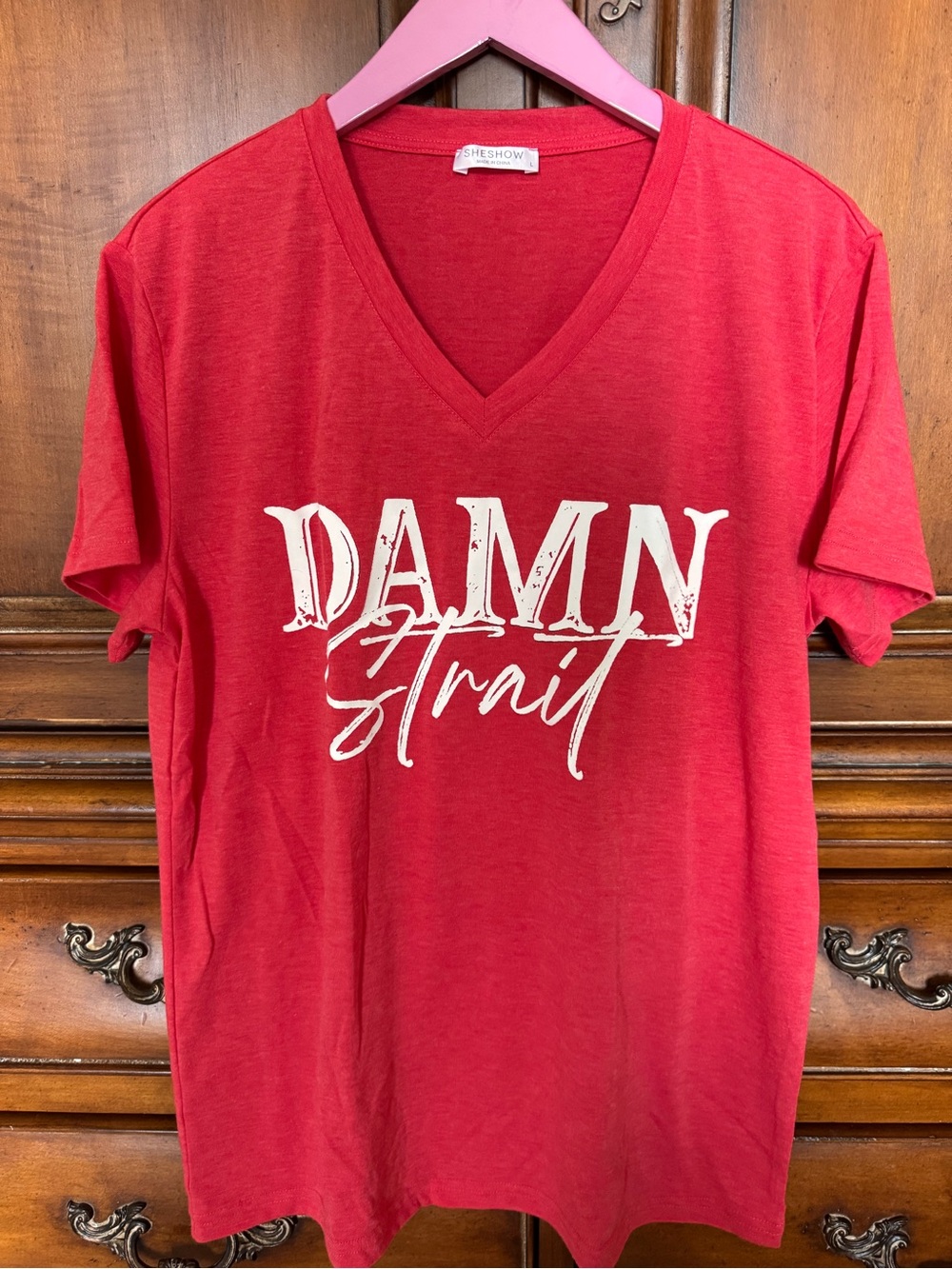 George Strait Red V-Neck Tee with "Damn Strait" Graphic